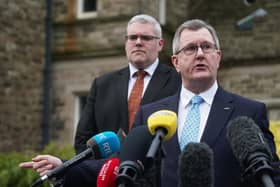 DUP leader Jeffrey Donaldson with, left, deputy, Gavin Robinson, who recently highlighted the benefits of the new deal struck with the UK government