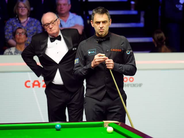 Ronnie O'Sullivan during his first round match against Jackson Page (not pictured) in the World Snooker Championship at the Crucible