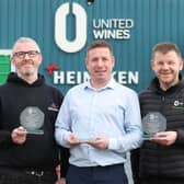 Three employees at Craigavon-based drinks firm United Wines have been recognised for their long service, having worked for the company for a combined total of 60 years.  Company accountant Rory Hill from Banbridge, stock controller Conor McStravick and his brother, goods in manager John McStravick, both from Aghagallon in Co Antrim, were each presented with a commemorative plaque and a gift voucher to mark 20 years’ service at the company’s County Armagh base