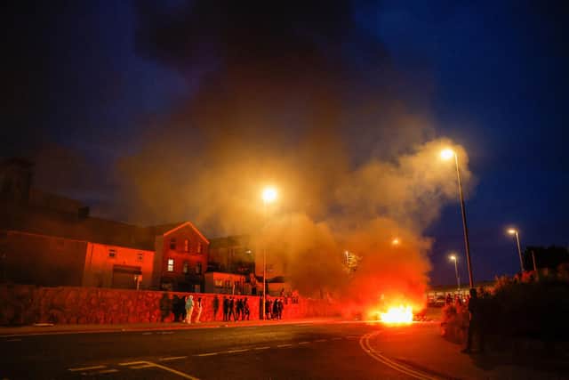 Bins were set alight in Ballymena during a third consecutive night of unrest. Photo by Press Eye