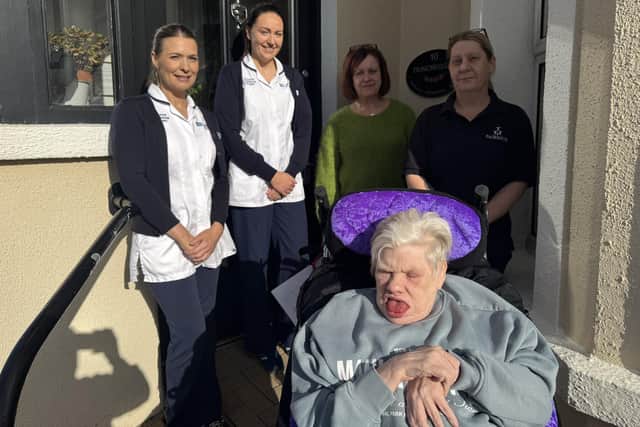 Samantha Boyle and Caoimhe Kirkpatrick, learning disability occupational therapists, Sonia Bradley, Duncreggan Residential Home manager and Sarah Toner, Duncreggan, with Elizabeth in her new bespoke moulded wheelchair