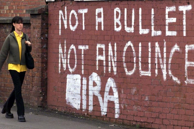 IRA letters painted below existing graffiti in republican west Belfast,the writing refers to the ongoing decommissioning row,and comes at a time when the IRA has blamed the British  Goverment for the failure to implement the Good friday Agreement.