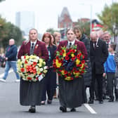 School children from Harmony PS and The Girls Model led a delegation that walked down the Shankill Road today to lay wreaths at the scene of the bomb in memory of those who were killed. Picture by Jonathan Porter/PressEye