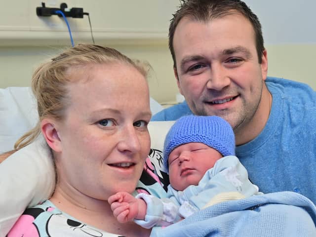 Mum Sophie Moulds and Dad Harry with her Baby boy Alfie who was born at 00.43 and weighed 81bs 4oz at the RVH on New Year's day.
Photo: Colm Lenaghan/Pacemaker