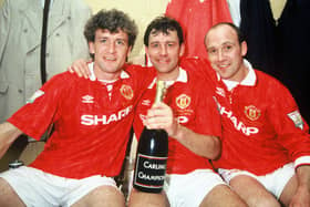Manchester United's Mike Phelan (right) with, from left, Mark Hughes and Bryan Robson during the 1993/94 season. (Photo by John Peters/Manchester United via Getty Images)