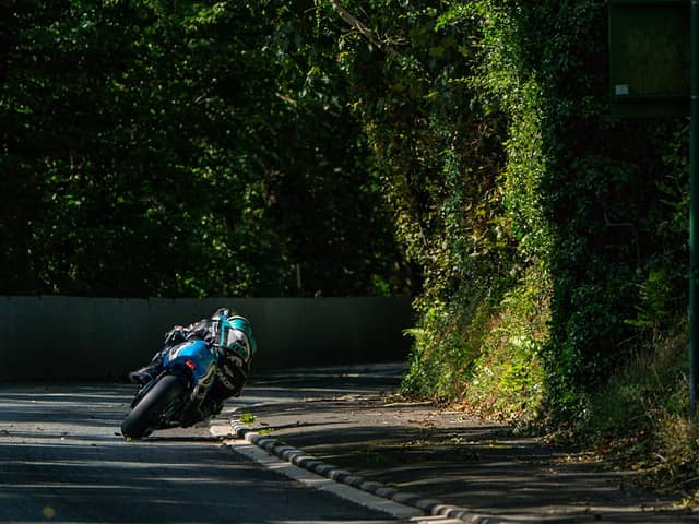 Michael Dunlop (Team Classic Suzuki GSX-R750) at Gorse Lea during the opening Classic Superbike practice session for the 2023 Manx Grand Prix.
