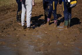Navigating the mud at the National Ploughing Championships at Ratheniska, Co Laois. Picture: Brian Lawless/PA Wire