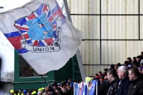 Rangers fans wave a large flag with the 'Union Bears' badge  during the William Hill Premiership match at The SMISA Stadium, Paisley against St Mirren on March 15. (Photo by Andrew Milligan/PA Wire)