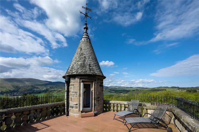 The incredible tower-top roof terrace is perfect for enjoying the sunset with a glass of fizz.