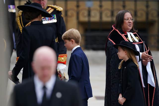 The Princess of Wales (left), Prince George (centre) and Princess Charlotte arriving at the State Funeral of Queen Elizabeth II, held at Westminster Abbey, London. Picture date: Monday September 19, 2022. PA Photo. See PA story FUNERAL Queen. Photo credit should read: Peter Byrne/PA Wire