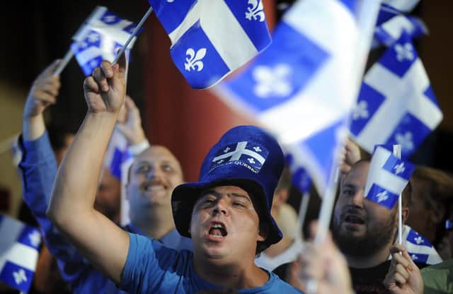Parti Quebecois supporters at a rally in Montreal. French speaking separatists almost won independence from Canada in a 1995 referendum, which might have made it seem that such a split was near, but now support for separation from the rest of the country is low (AP Photo/The Canadian Press, Graham Hughes)