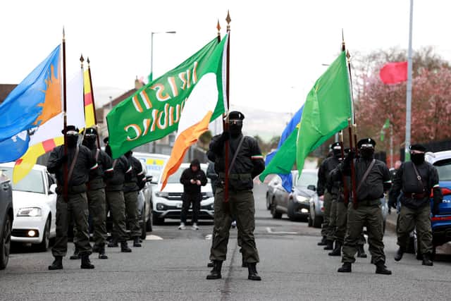 A colour party prepares to start their Easter Monday parade through the Creggan area of Londonderry, commemorating the anniversary of the Easter Rising Rebellion of 1916. Picture date: Monday April 1, 2024. PA Photo. See PA story ULSTER Parade. Photo credit should read: Liam McBurney/PA Wire
