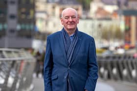 Mark Durkan, deputy First Minister of Northern Ireland from November 2001 to October 2002, and the Leader of the Social Democratic and Labour Party (SDLP) from 2001 to 2010, standing on the Peace Bridge in Londonderry