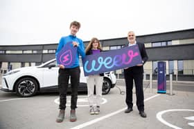 South West College is plugging into a greener future with new electric vehicle (EV) chargers provided by leading charge point operator Weev. Pictured are South West College students Fiacra Avery and Zara Hutchinson with Weev CEO Philip Rainey
