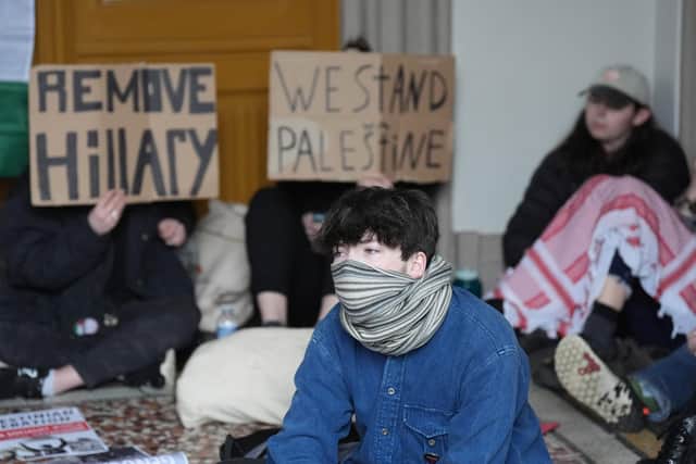 Members of the Queen's University Belfast (QUB) Palestine Assembly hold a 'sit in' in the main Lanyon building of the campus in Belfast. Photo: Niall Carson/PA Wire