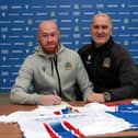 Chris Shields pictured with Linfield chief scout Willie McKeown after signing his contract extension. PIC: Pacemaker