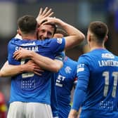Rangers' John Souttar (left) celebrates with Ben Davies after scoring their fourth goal of the game during the cinch Premiership match at Ibrox Stadium, Glasgow. PIC: Andrew Milligan/PA Wire.