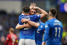 Rangers' John Souttar (left) celebrates with Ben Davies after scoring their fourth goal of the game during the cinch Premiership match at Ibrox Stadium, Glasgow. PIC: Andrew Milligan/PA Wire.
