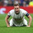Harry Kane of Tottenham Hotspur looks on from the ground after missing a chance to score during the UEFA Champions League round of 16 leg two match between Tottenham Hotspur and AC Milan at Tottenham Hotspur Stadium.
