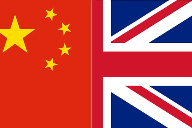 The flags of China and the UK