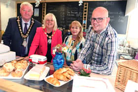 A pioneering new community café supported by Causeway Coast and Glens Borough Council has opened its doors in Ballycastle – using a menu made up entirely of food that would otherwise have gone to waste. The volunteer-led Ballycastle Community Café uses surplus or unwanted food donated by the community and local businesses, which was destined to be thrown away. Pictured is mayor of Causeway Coast and Glens, councillor Steven Callaghan and deputy mayor, councillor Margaret-Anne McKillop pictured with Ballycastle Community Hub manager, Dessie Smyth and chair Katie Morgan