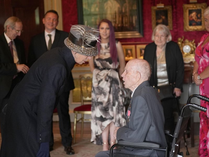 The Princess Royal presenting 106-year-old veteran Norman Irwin with his British Empire Medal (BEM) before attending the annual garden party at Hillsborough Castle during her visit to Northern Ireland. Picture date: Wednesday September 10, 2025. PA Photo. Photo credit should read: Niall Carson/PA Wire
