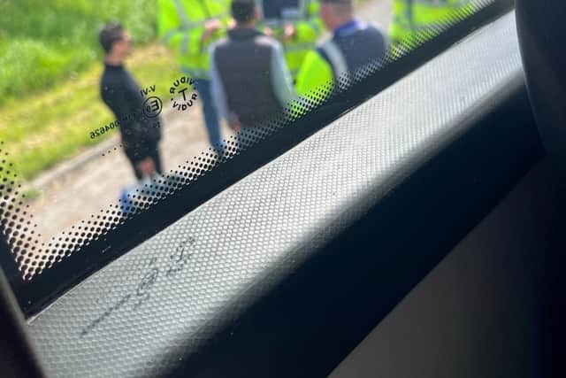 Irish immigration officials checking travel documents after boarding a bus travelling from Northern Ireland into the Republic in 2024.