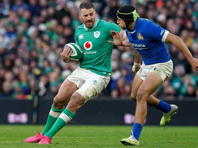 Ireland's Stuart McCloskey (left) is tackled by Italy's Ignacio Brex Juan during the Guinness Six Nations match at the Aviva Stadium in Dublin. (Photo by Brian Lawless/PA Wire)
