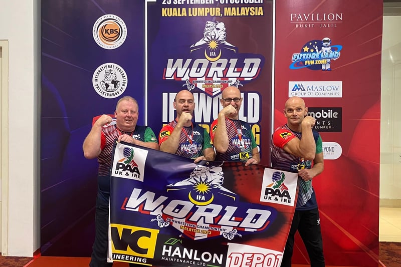 Andy Thorn from England with Northern Ireland arm-wrestlers Stanley Hamilton, David Gibson and Dan Axeworthy England in Malaysia World Championships 2023