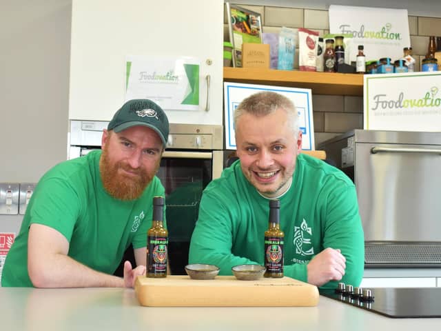 Gary Patterson and Patrick Walker of Emerald Ire hot sauces in the development kitchen at FoodOvation in Londonderry