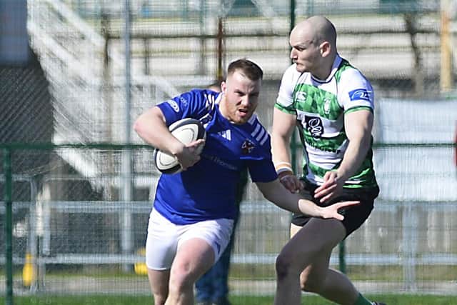 Queen’s Charlie Irvine (left) reflected on the weekend's victory against Highfield