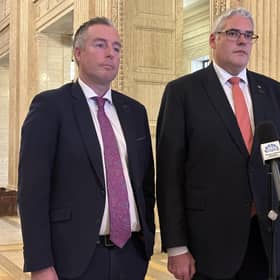 Education Minister Paul Givan (left) and DUP leader Gavin Robinson speak to the media at Parliament Buildings in Stormont, Belfast, following a meeting with Secretary of State Sir Chris Bryant. Picture: Rebecca Black/Press Association