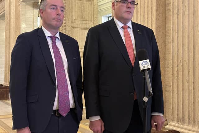 Education Minister Paul Givan (left) and DUP leader Gavin Robinson speak to the media at Parliament Buildings in Stormont, Belfast, following a meeting with Secretary of State Sir Chris Bryant. Picture: Rebecca Black/Press Association