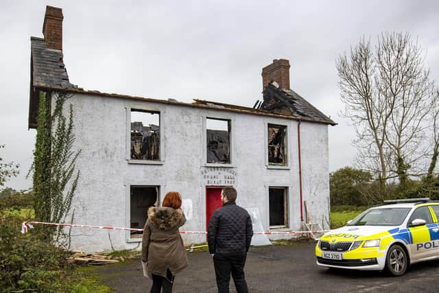 PSNI detectives looking at Ballynougher Orange Hall on Aghagaskin Road in Magherafelt, Co Londonderry, which was extensively damaged by a fire on Sunday evening. Photo: Liam McBurney/PA Wire