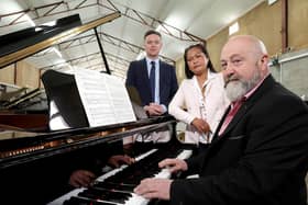 Belfast Pianos doubles capacity with Ulster Bank support. Pictured are Ulster Bank business development manager Lee White with business owners Steven and Jeena