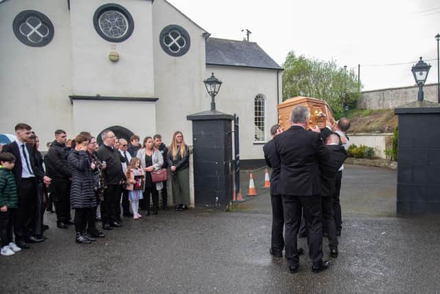Relatives and friends at the funeral of Julia McSorley at St Eugene's Church, Glenock, County Tyrone.