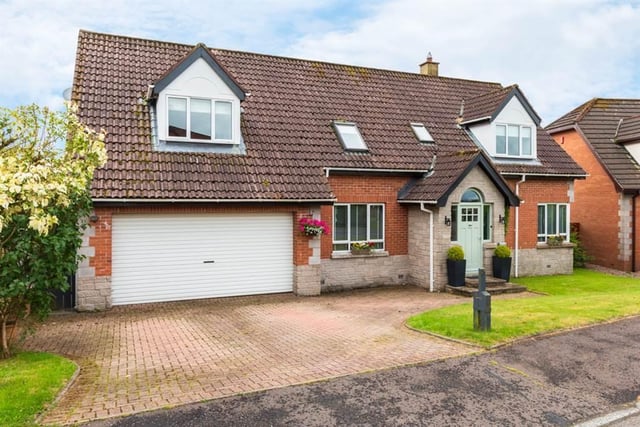 The detached chalet-style property is situated just on the outskirts of Ballynure village.