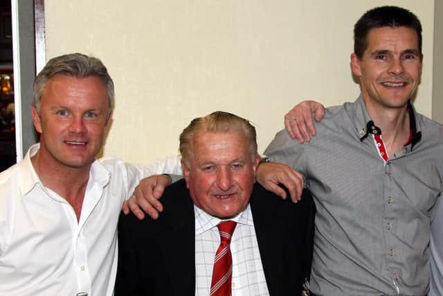 Long-serving Portadown groundsman Walter McElroy (centre) in 2013 with former players Gregg Davidson (left) and Brian Strain at a club function. (Photo by Johnston Press)