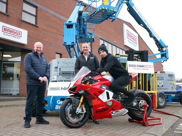 Eight-time North West 200 Superbike race winner Glenn Irwin with Mervyn Whyte (left), NW200 race boss, and Briggs Equipment Ireland Managing Director, Gary Clements