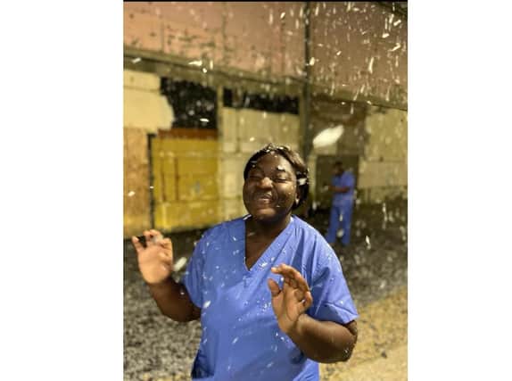 Nurse Adwoa Aninkora from Ghana experiencing snow for the first time in her life