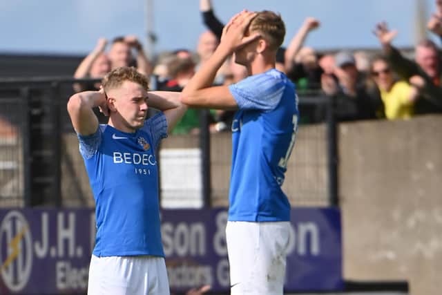 Glenavon players react to Glentoran's winning goal nine minutes into added time at Mourneview Park. (Photo by Stephen Hamilton/PressEye)