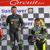 Carl Phillips won the Sunflower Trophy from Eugene McManus (left) and Jonny Campbell in 2025. (Photo by Rod Neill/Pacemaker Press)