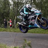 Michael Dunlop claimed pole position in Supersport qualifying on his MD Racing Yamaha at the Armoy Road Races on Friday.