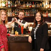 Eimear Callaghan, head of experience and industry development at Tourism NI pictured with Ruairi Lawther, a bar tender at the Fitzwilliam Hotel in Belfast and Marian O’Hara, human resource manager at the Fitzwilliam Hotel