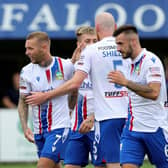 Linfield winger Kirk Millar celebrates after netting in the 3-2 success against Dungannon Swifts at Stangmore Park