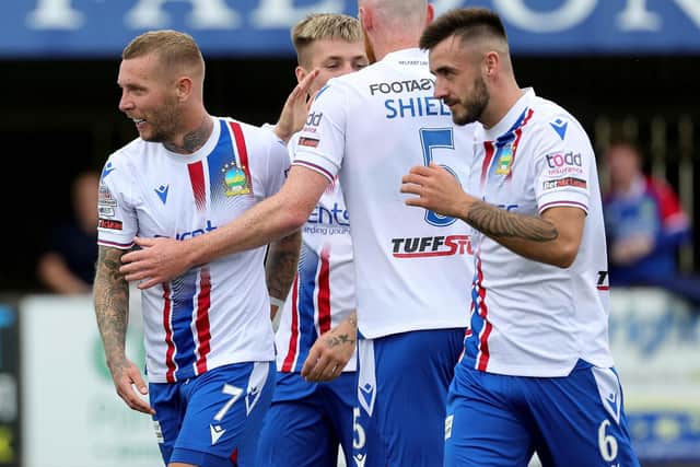 Linfield winger Kirk Millar celebrates after netting in the 3-2 success against Dungannon Swifts at Stangmore Park
