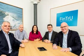 FinTrU has announced plans to invest over £20m by 2027, which will see the creation of 300 new jobs in Londonderry and a significant investment in the skills of its Northern Ireland wide staff. Pictured are Mel Chittock interim CEO, Invest NI, Steven Murtland, chief financial officer, Kathleen McDermott, executive director, Greg McCann, executive director and Darragh McCarthy, founder & CEO