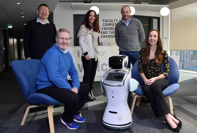 Kainos and Ulster University open AI Research Centre to drive society-wide benefits. Pictured are Jun Liu, reader, school of computing, Ulster University, Karen Delgado, deputy director, Alumni and corporate engagement, development and Alumni relations office, Ulster University, Chris Nugent, head of school of computing, Ulster University, Thomas Gray, chief technology officer, Kainos and Ruth McGuinness, practice lead, Kainos