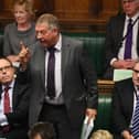 DUP MP Sammy Wilson, speaking alongside Gavin Robinson MP in the House of Commons, on a Brexit Withdrawal Agreement Bill debate in 2019, On the left is the then MP and DUP deputy leader Nigel Dodds. Credit UK Parliament/Jessica Taylor