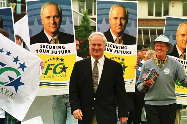 File photo dated 05/06/97 of Fine Gael leader John Bruton with his supporters at a shopping centre on the outskirts of Dublin on the eve of the Irish elections